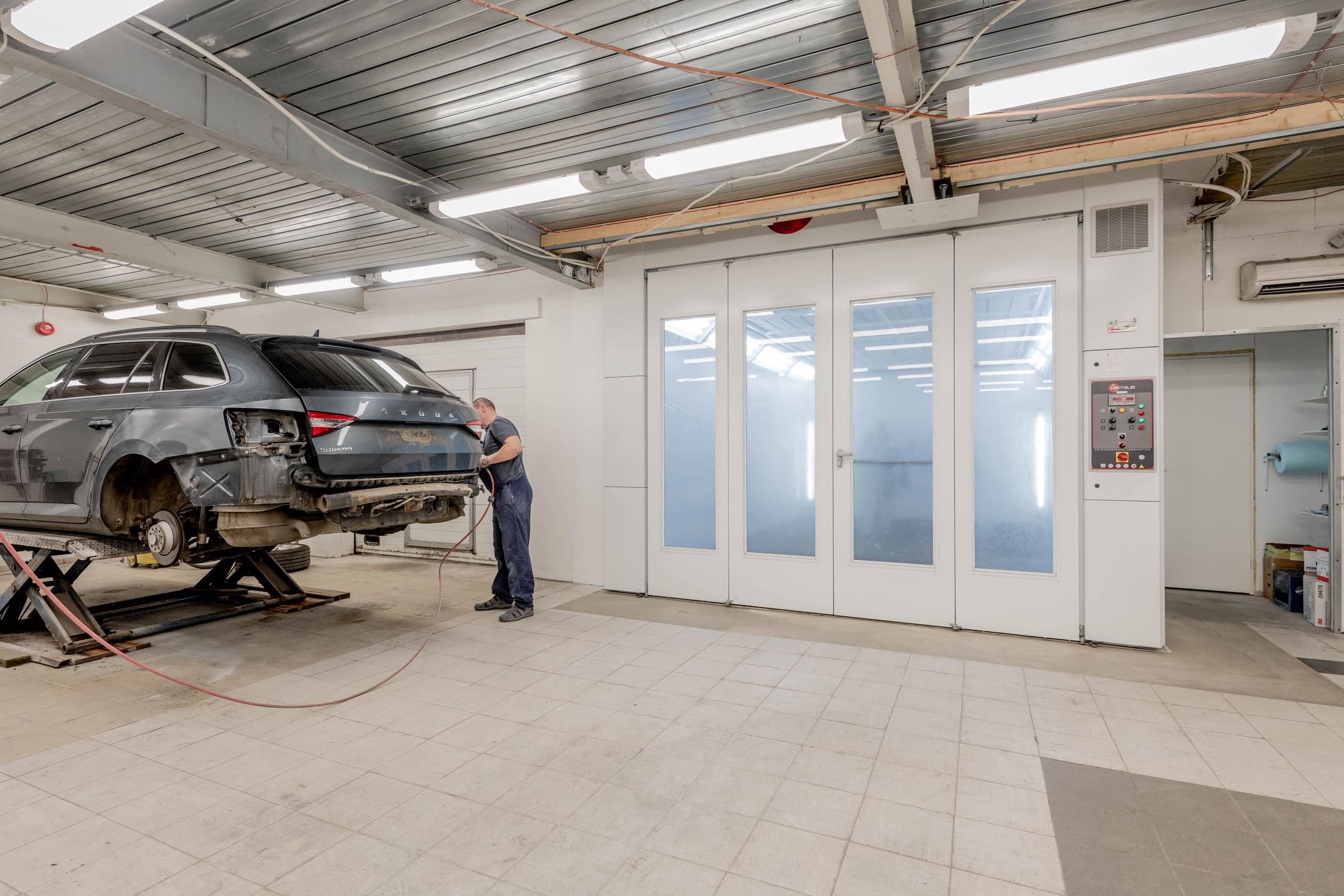 Vehicle arriving at a clean, modern service bay