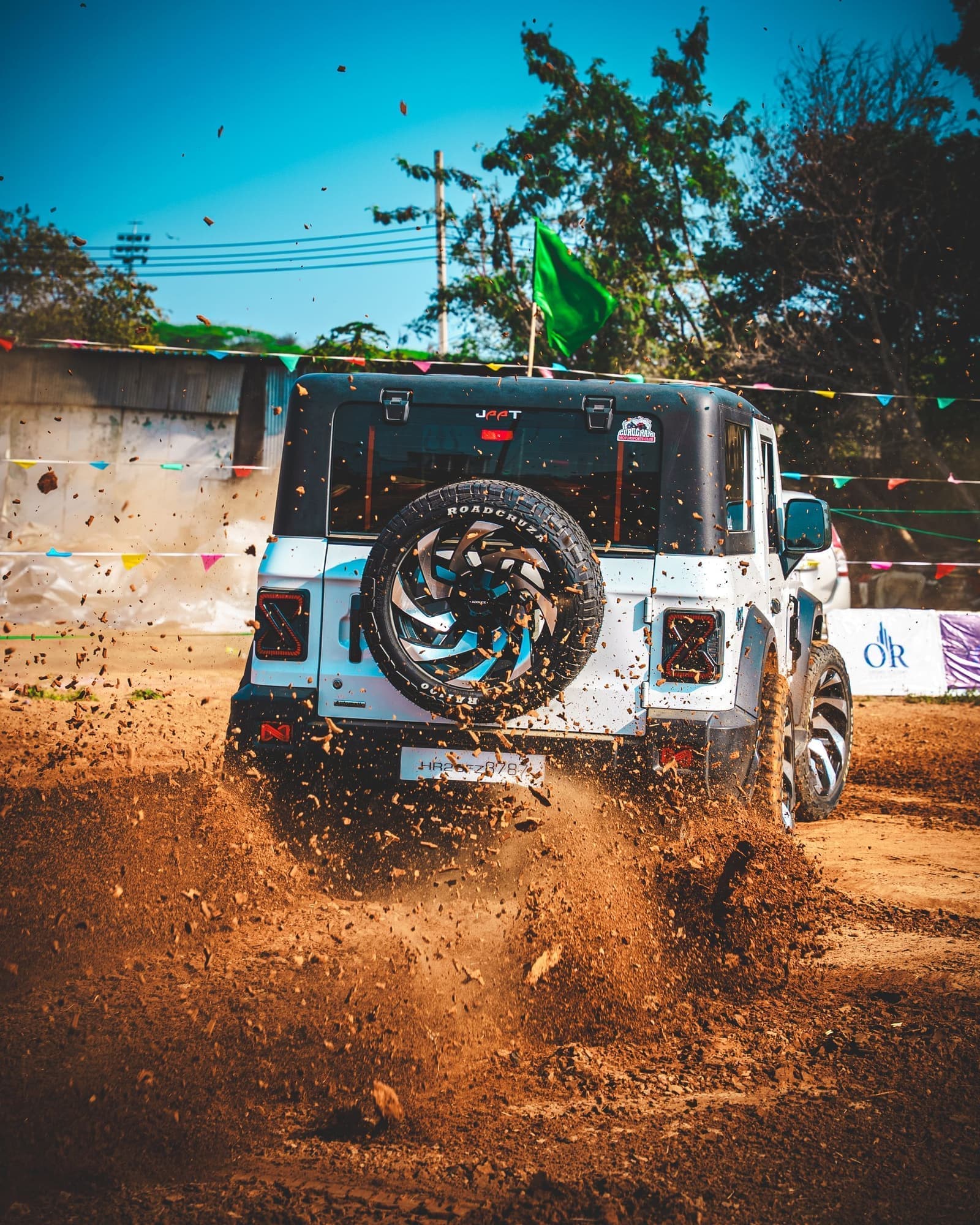 4WD vehicle tackling rugged off-road terrain